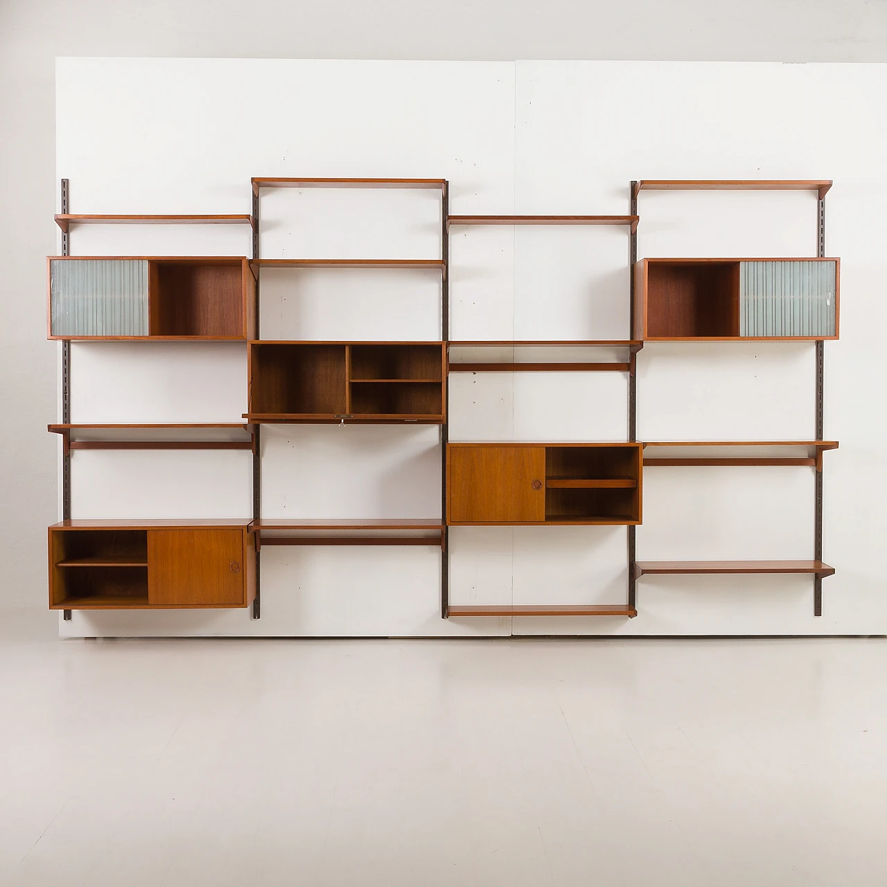 Four-bay teak wall unit by K. Kristiansen for FM Mobler, 1960s 6