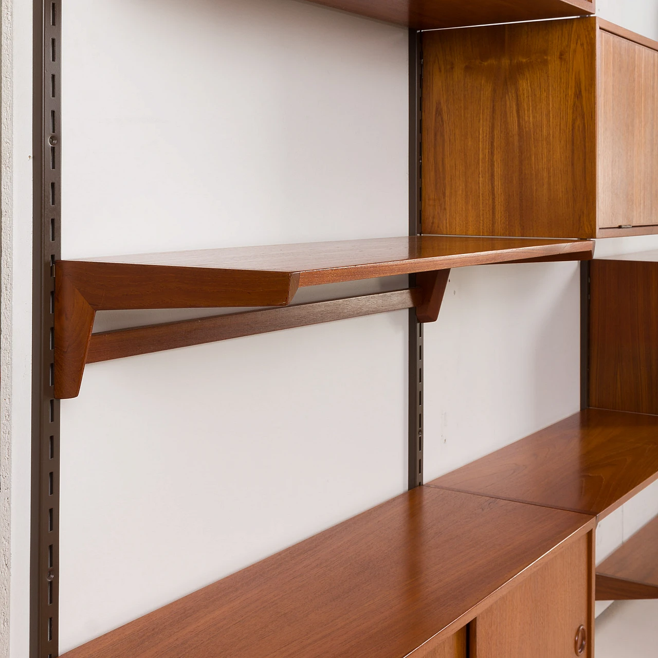 Four-bay teak wall unit by K. Kristiansen for FM Mobler, 1960s 16