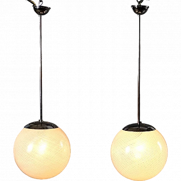 Pair of metal chandeliers with worked glass spheres, 1960s