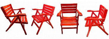 4 Orange Reguitti-style folding chairs, 1980s