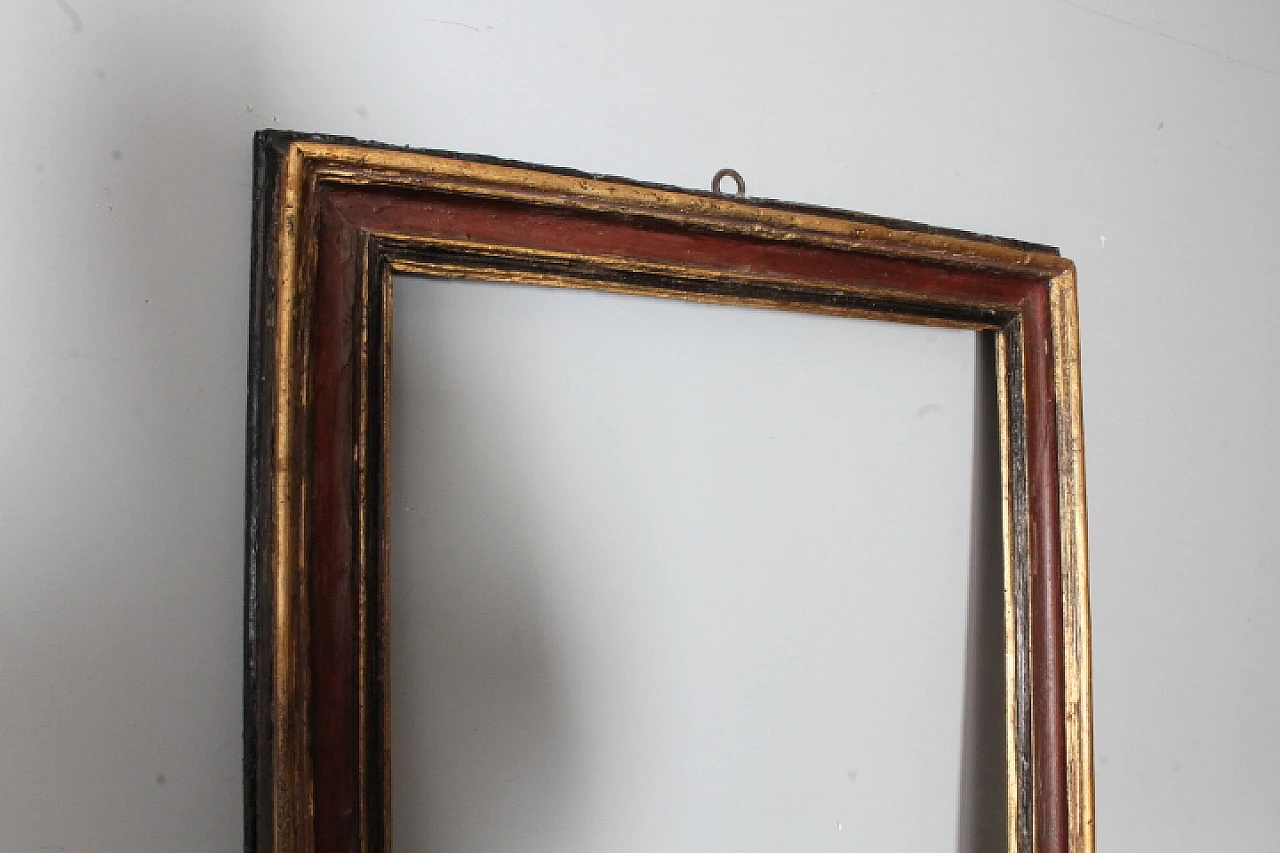 Painted frame in carved and lacquered wood, '600 9