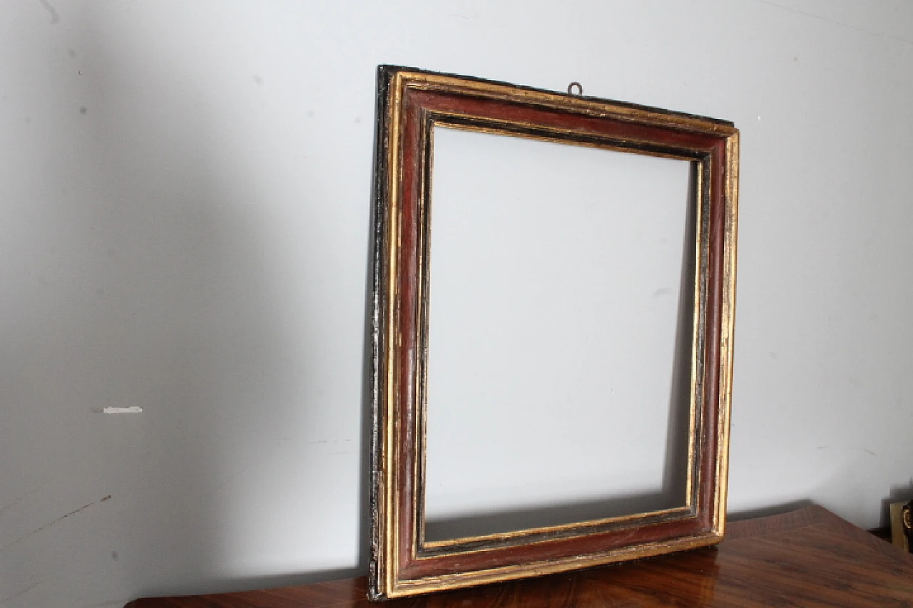 Painted frame in carved and lacquered wood, '600 10