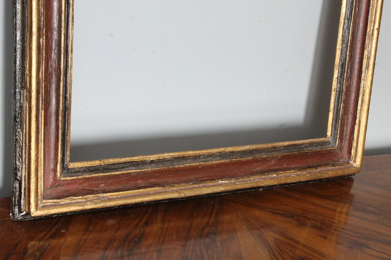 Painted frame in carved and lacquered wood, '600 11