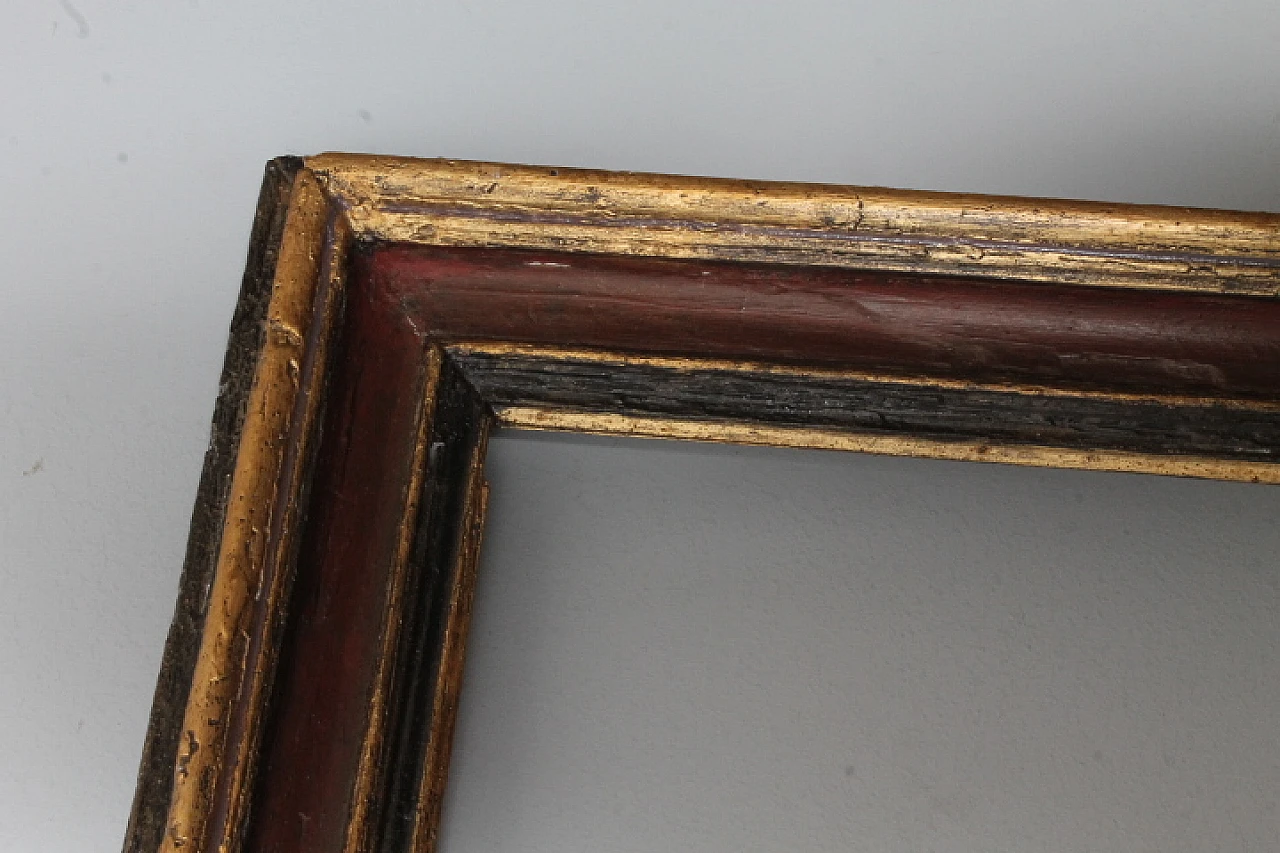 Painted frame in carved and lacquered wood, '600 12