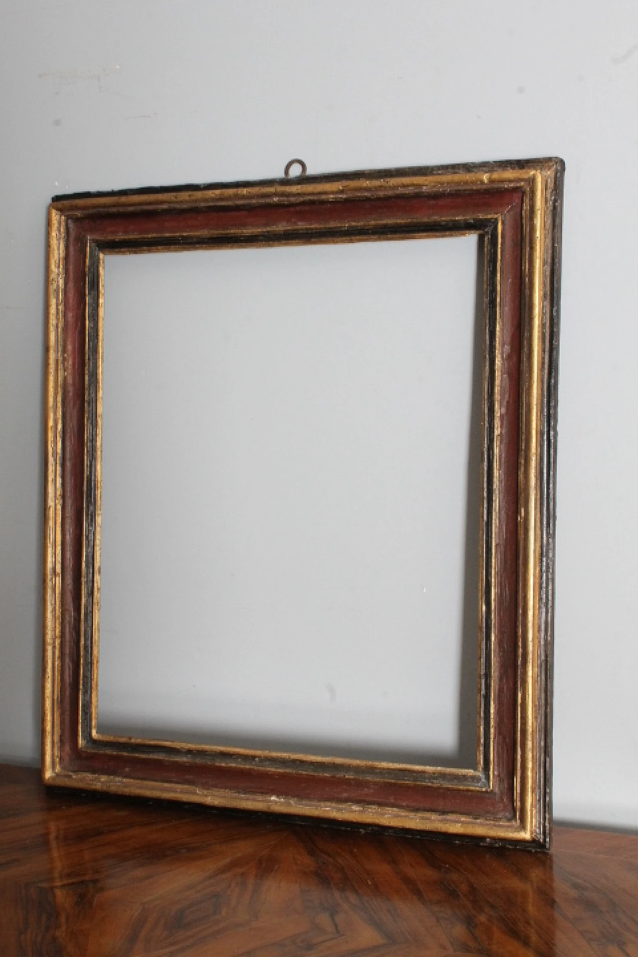 Painted frame in carved and lacquered wood, '600 14