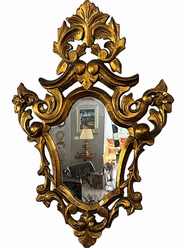 Wooden mirror carved and gilded with gold leaf, early 20th century