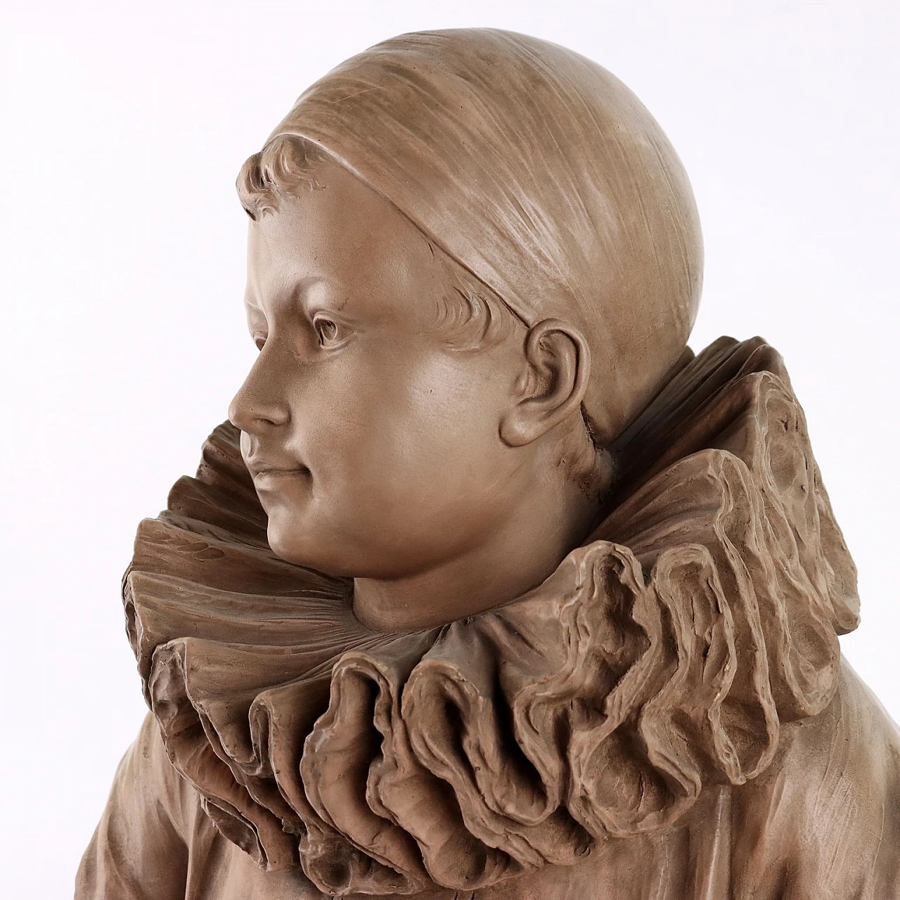 Terracotta bust of a boy by Herman Heusers, early 20th century 3