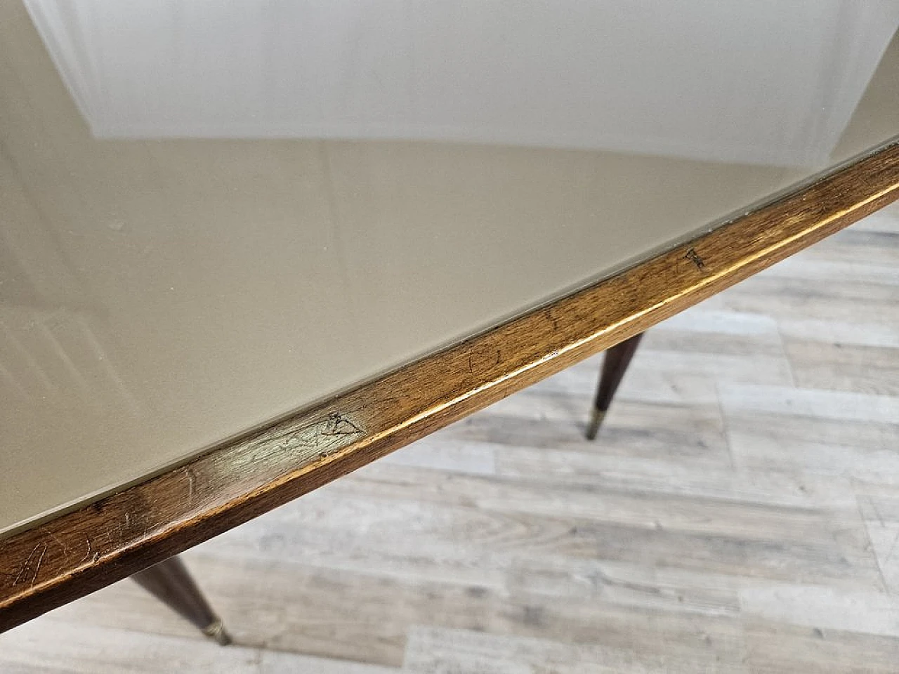 Walnut dining table with glass top and brass decorations, 1940s 10