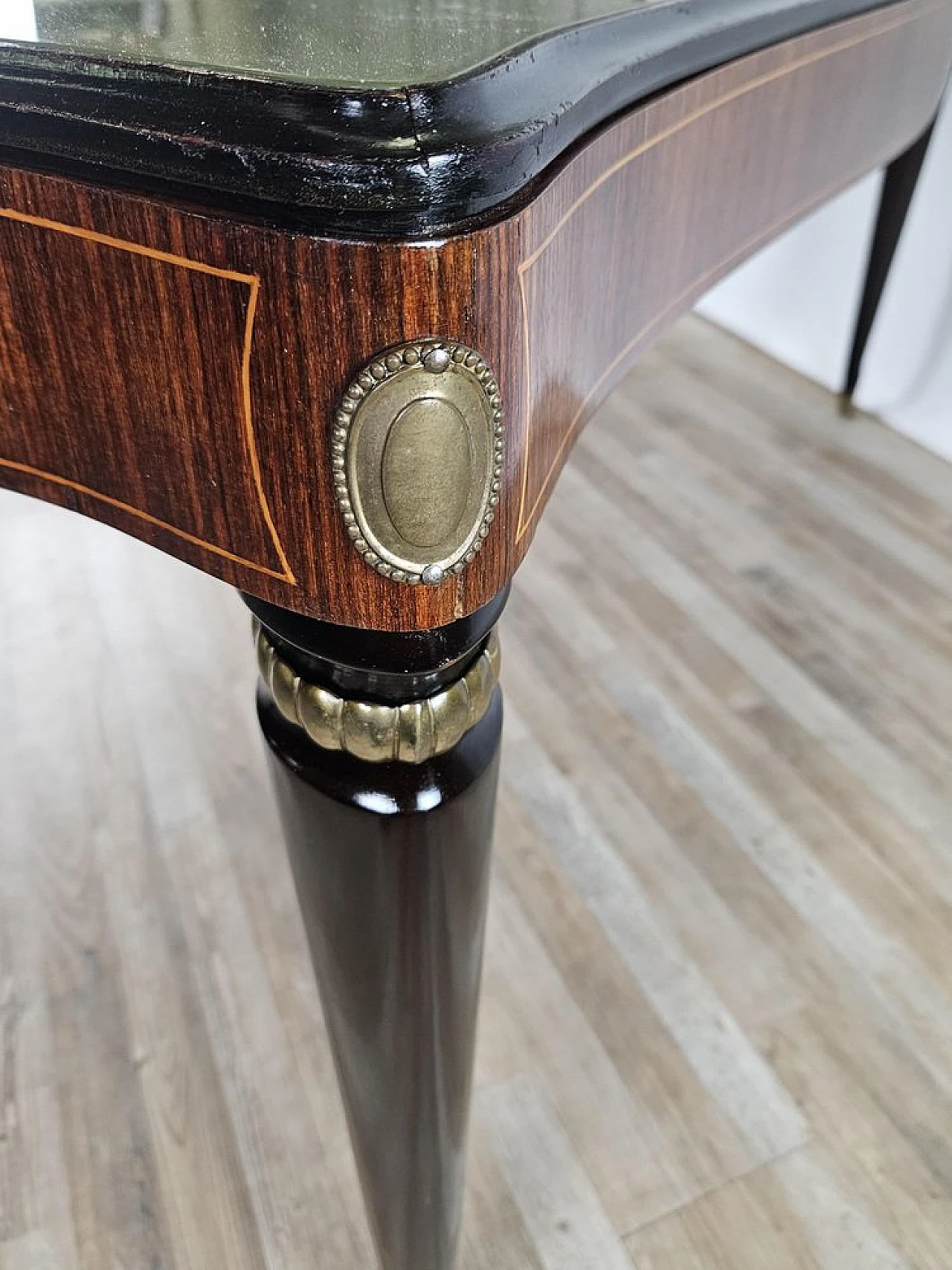 Mahogany table with glass top and brass decorations, 1950s 30