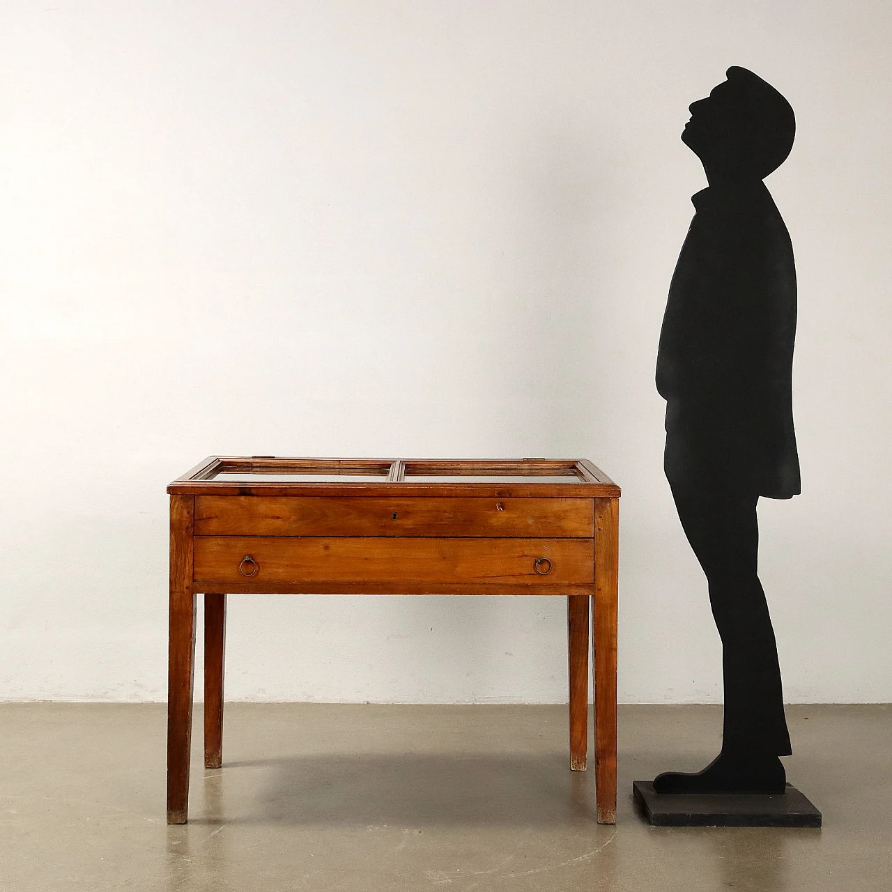 Stained poplar table with drawer and glass case, 19th century 2