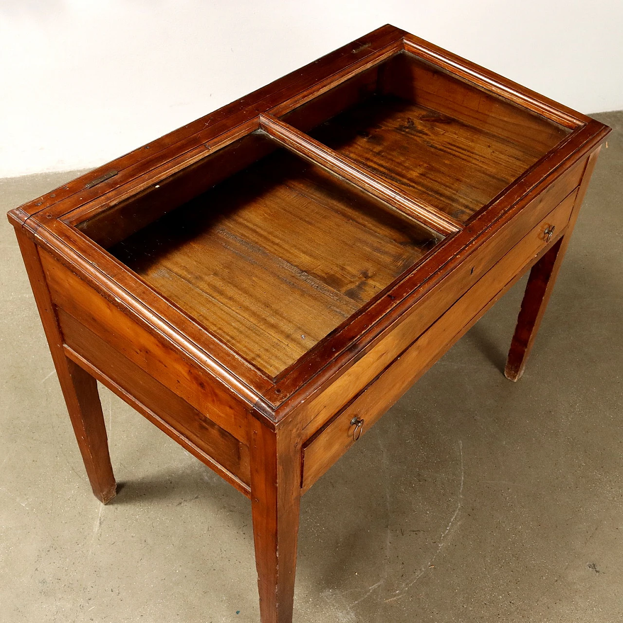 Stained poplar table with drawer and glass case, 19th century 3