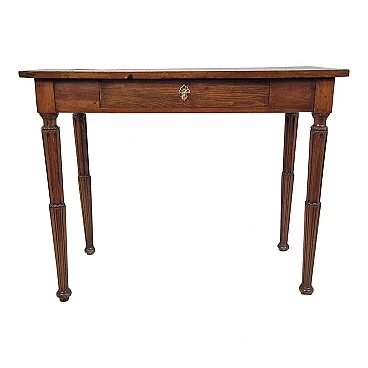 Wooden game table with pyramidal fluted legs, 19th century