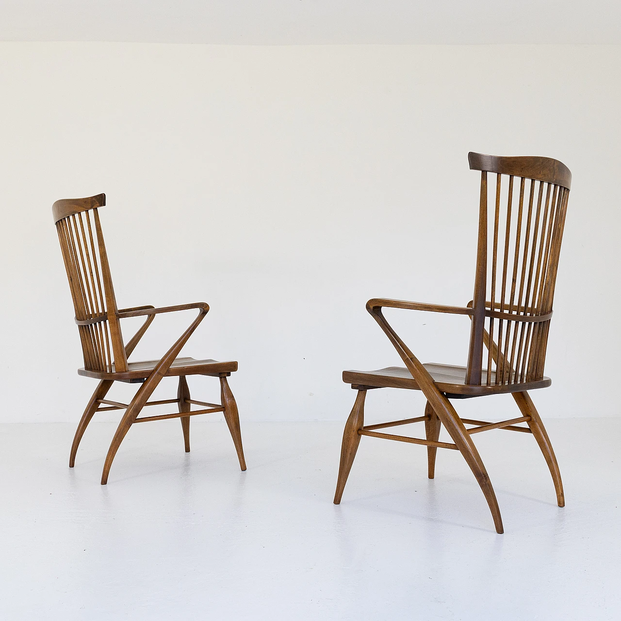 Pair of shaped walnut armchairs by Maurizio Tempestini, 1950s 1