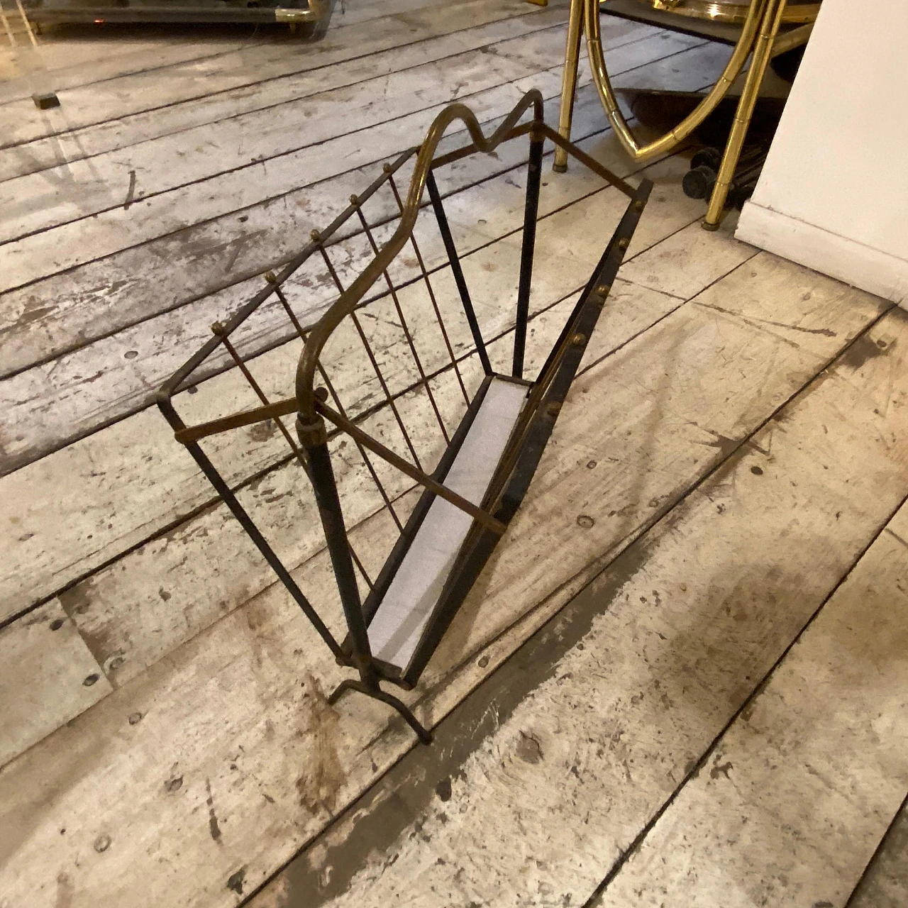 Black painted iron and brass magazine rack, 1950s 5