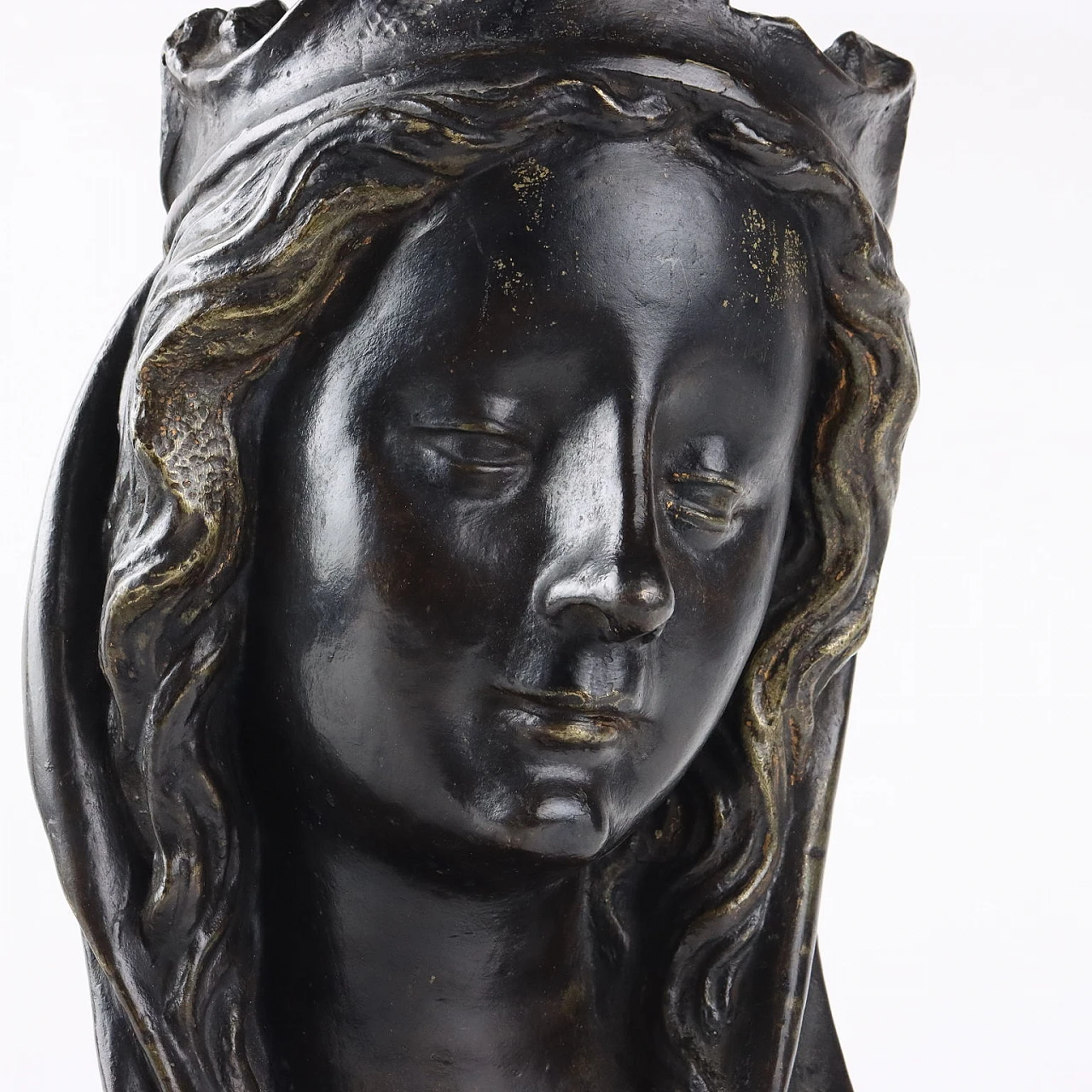 Female face in bronze, 1950s 3