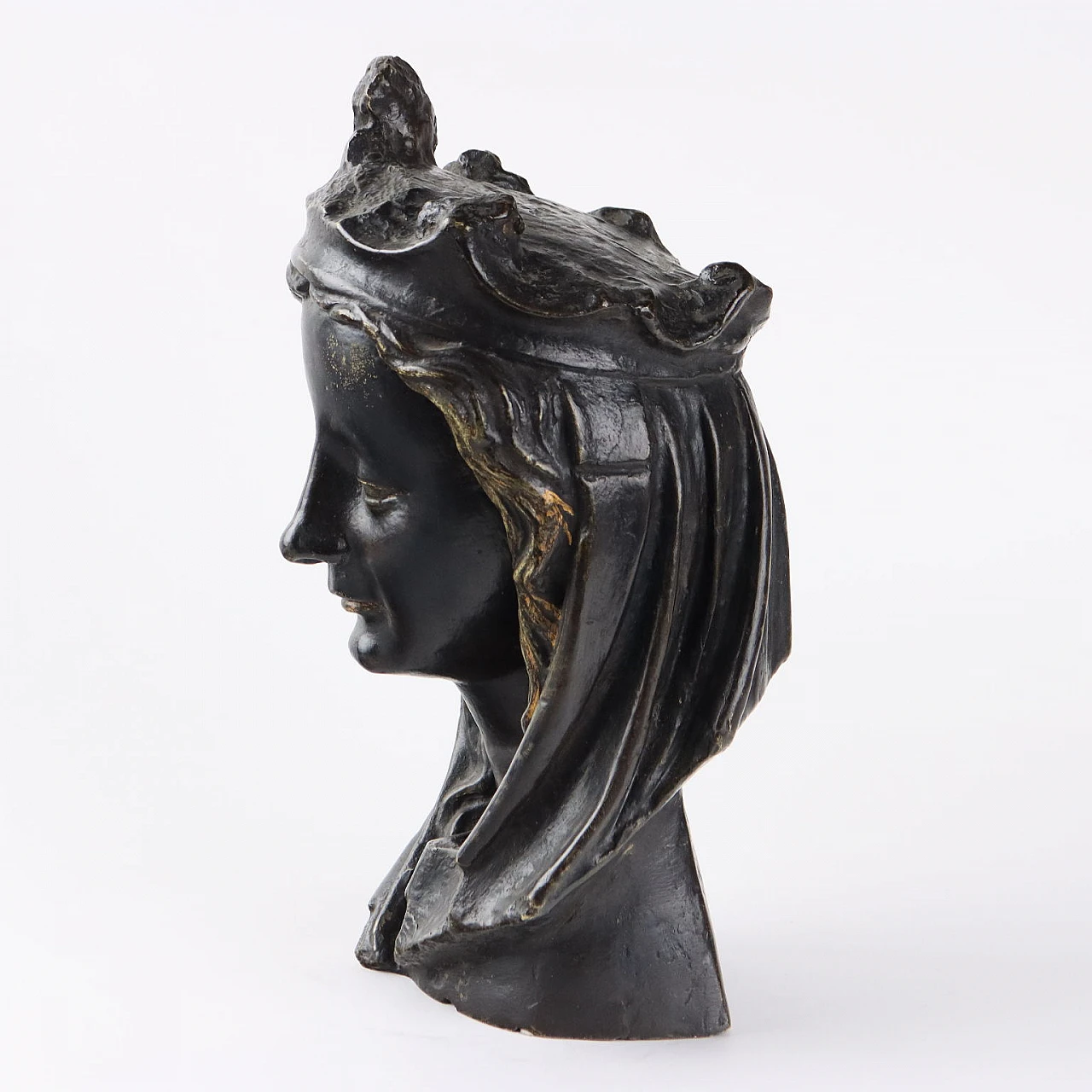 Female face in bronze, 1950s 8