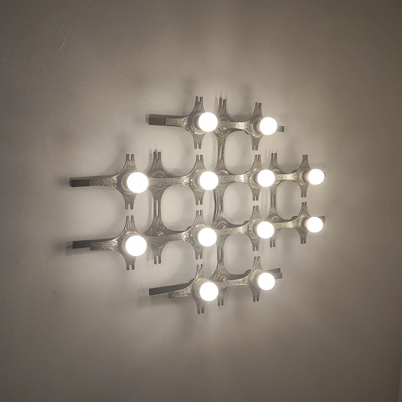 Brutalist wall lamp by Fantoni, 1960s 4