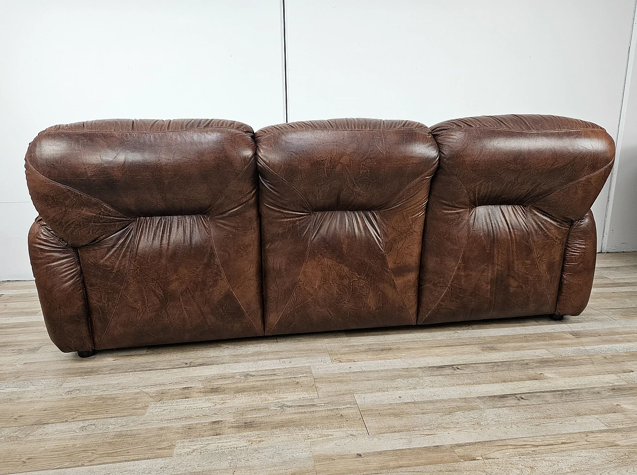 Brown leather club sofa,  1970s 26