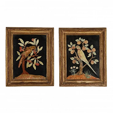 Pair of polychrome scagliola plaques depicting parrots, 17th century