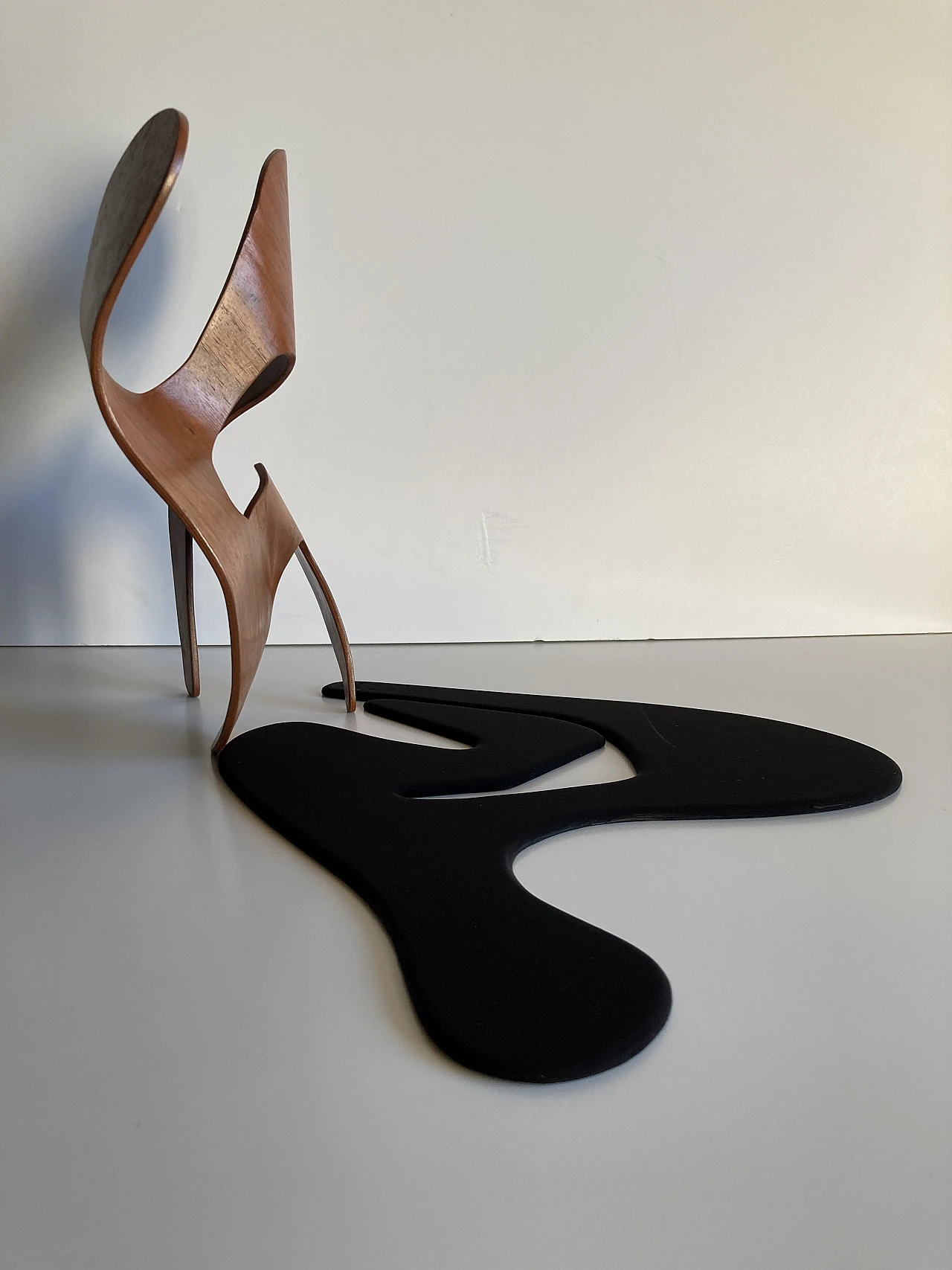 Mrs. Charles Eames_ The shadow does not bend, walnut plywood sculpture 47