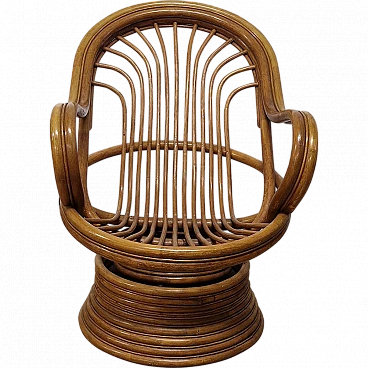 Swivel rocking armchair in bamboo and rattan