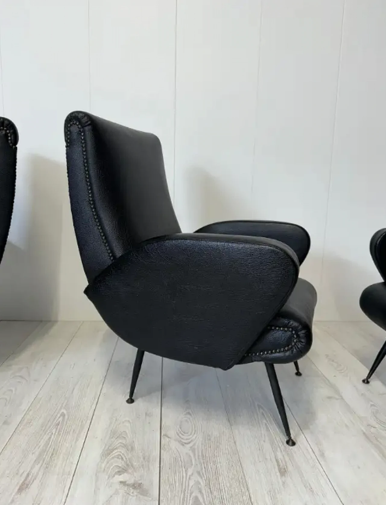 3 Leather and metal amrchairs, 1950s 6