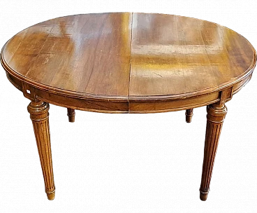 Round extendible French table in solid walnut, 19th century