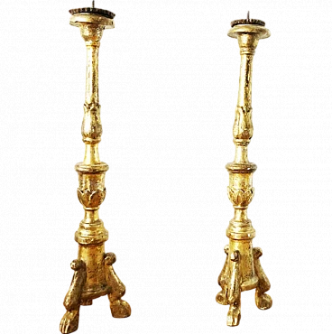 Pair of wooden and gold leaf candlesticks, 18th century