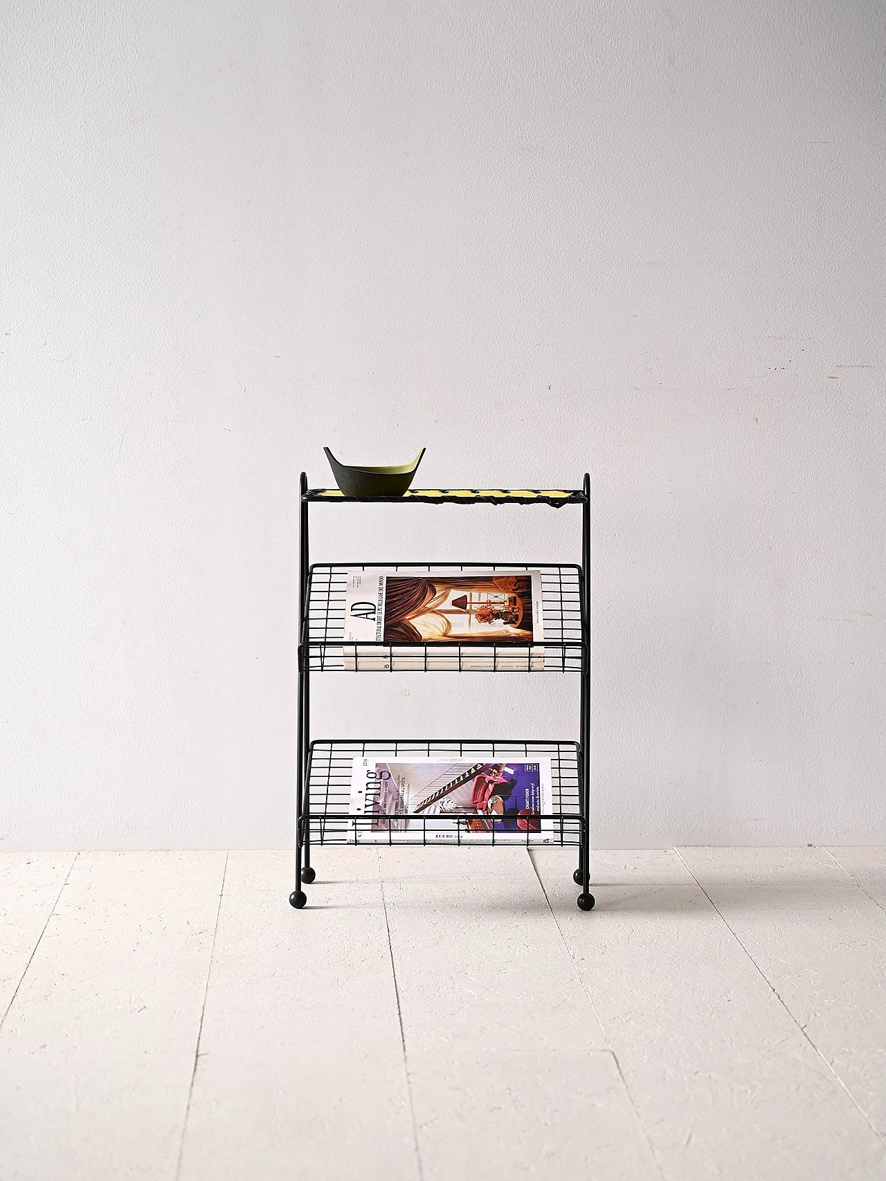 Black metal magazine rack 1