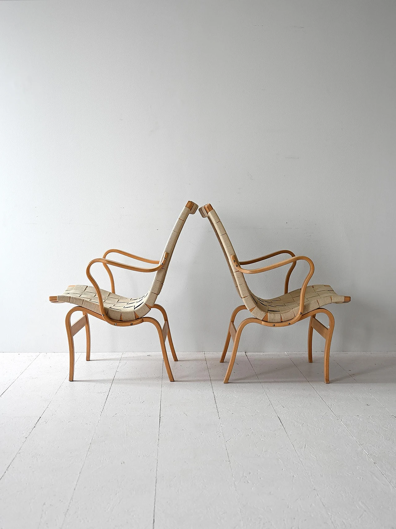 Pair of "Eva" armchairs by Bruno Mathsson 4