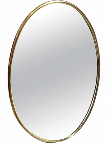 Oval wall mirror in solid brass by Gio Ponti, 1960s