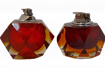 Two multifaceted table lighters in Murano glass, 1960s