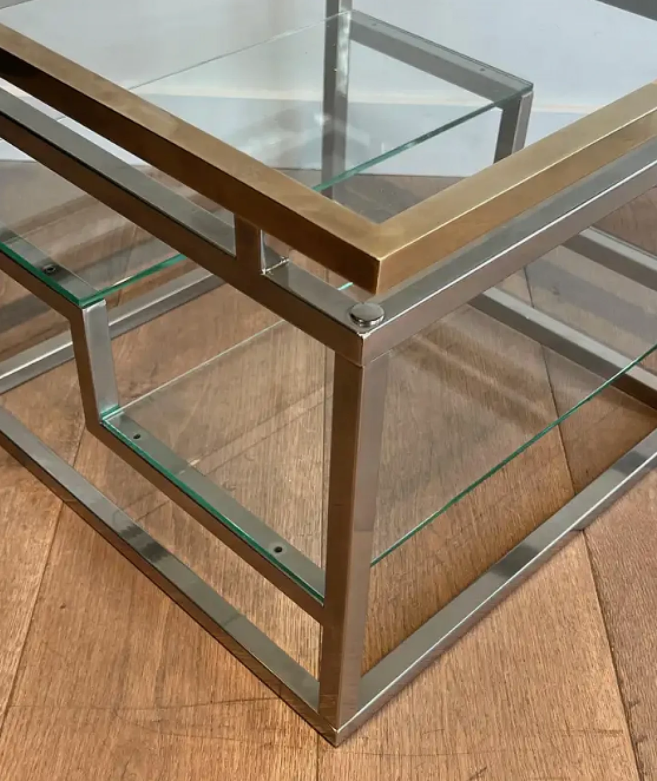 Pair of French coffee tables in chrome, brass and glass, 1970s 4