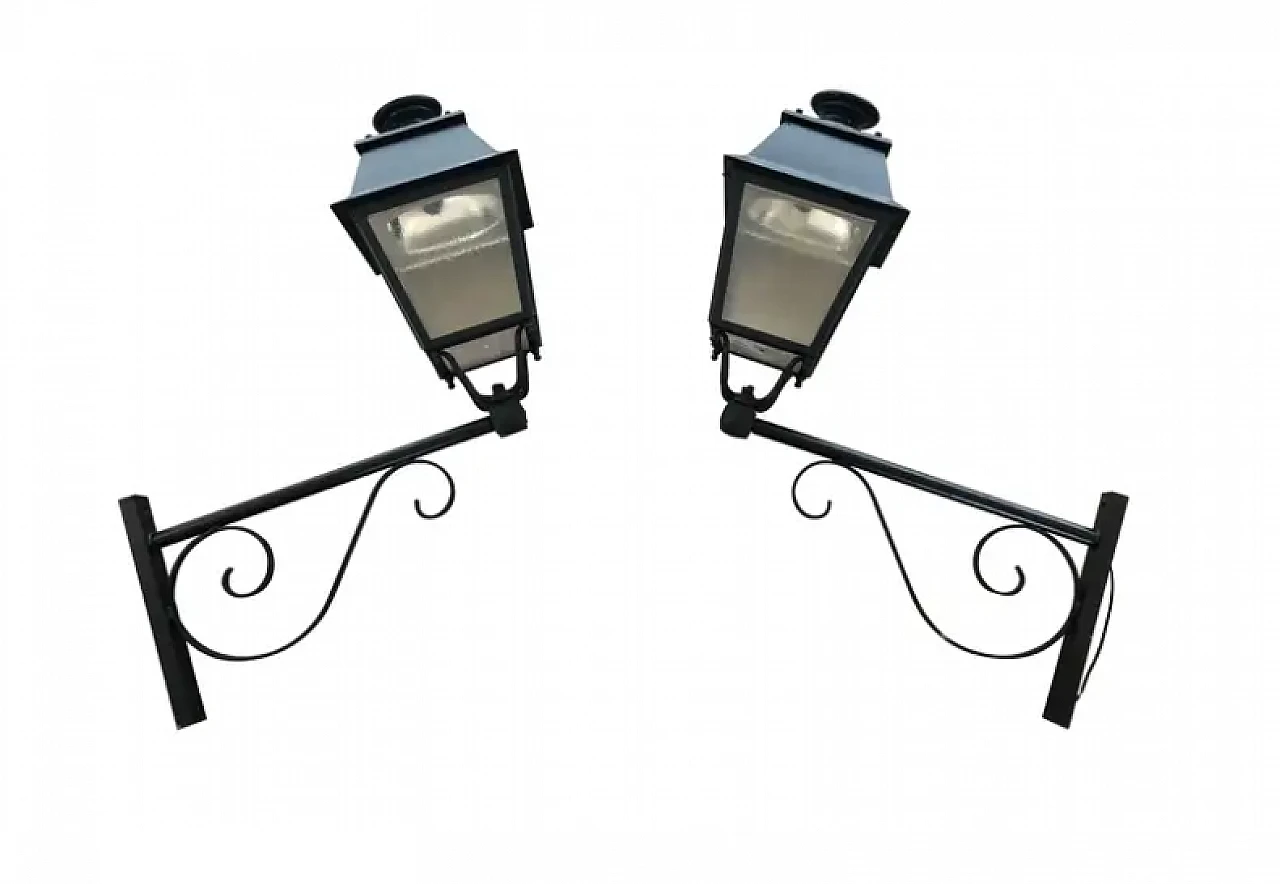 Pair of iron outdoor lanterns on shelves, 1950s 1