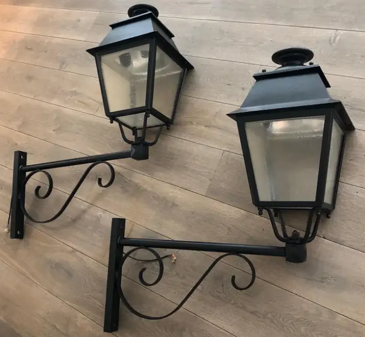 Pair of iron outdoor lanterns on shelves, 1950s 9