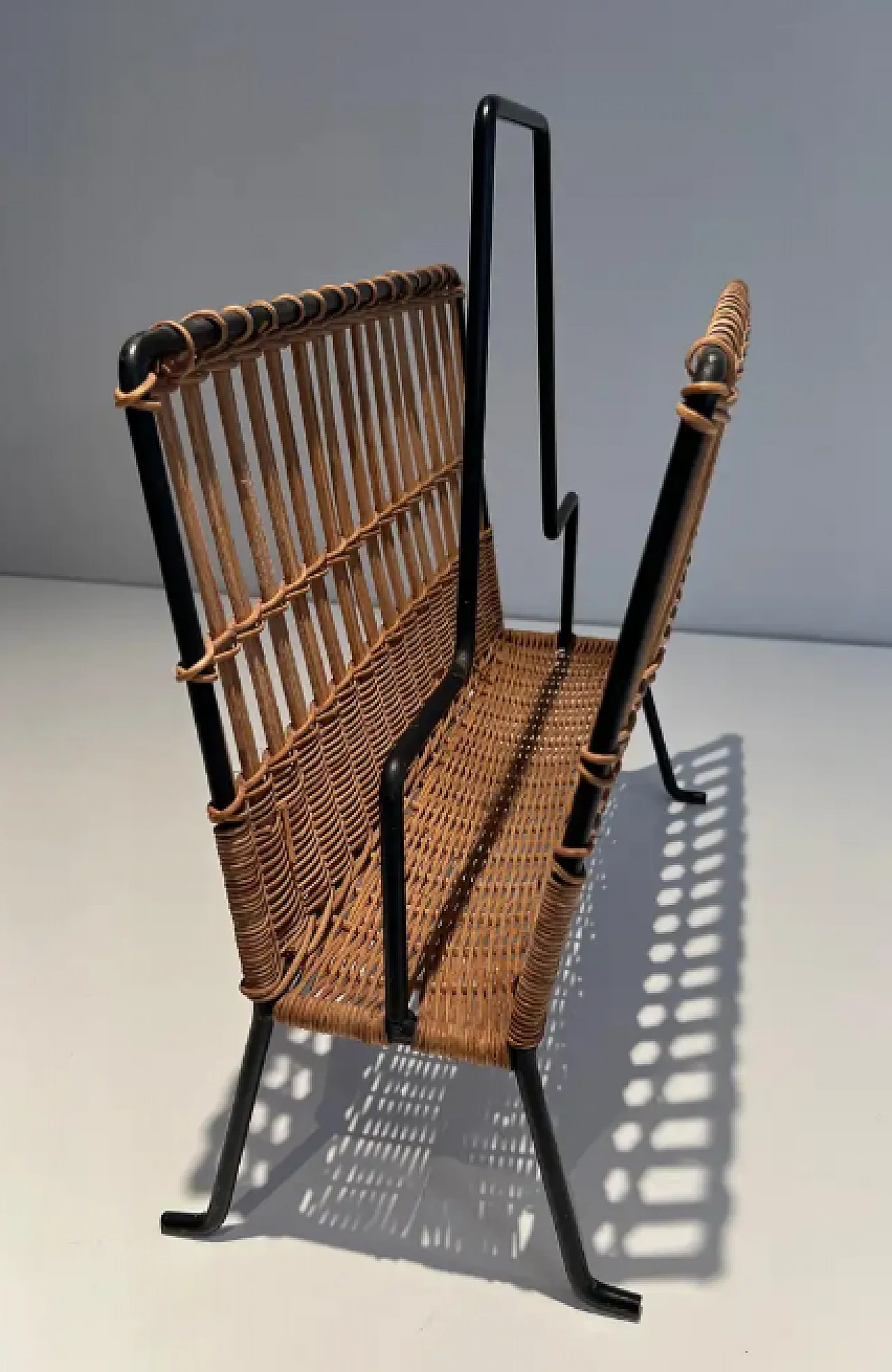 Rattan and black lacquered magazine rack, 1950s 5