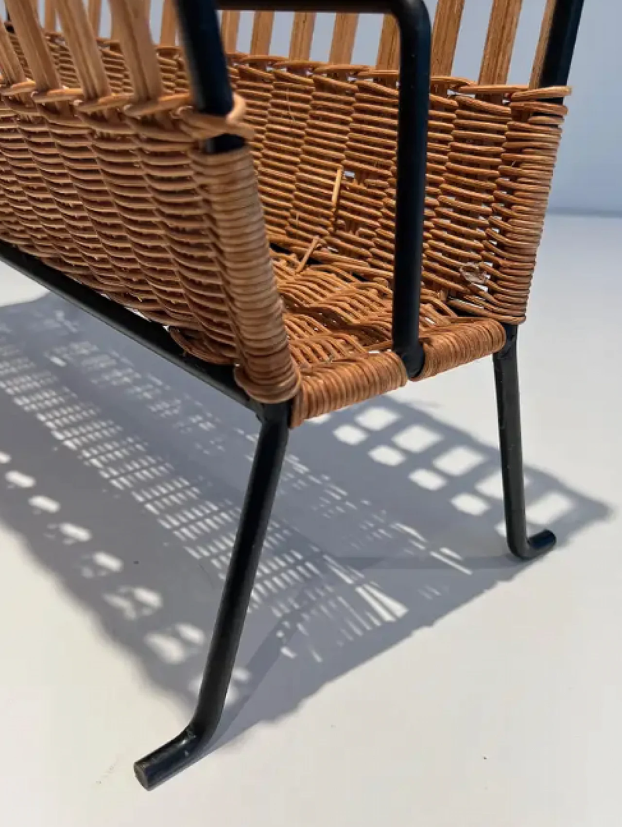 Rattan and black lacquered magazine rack, 1950s 11