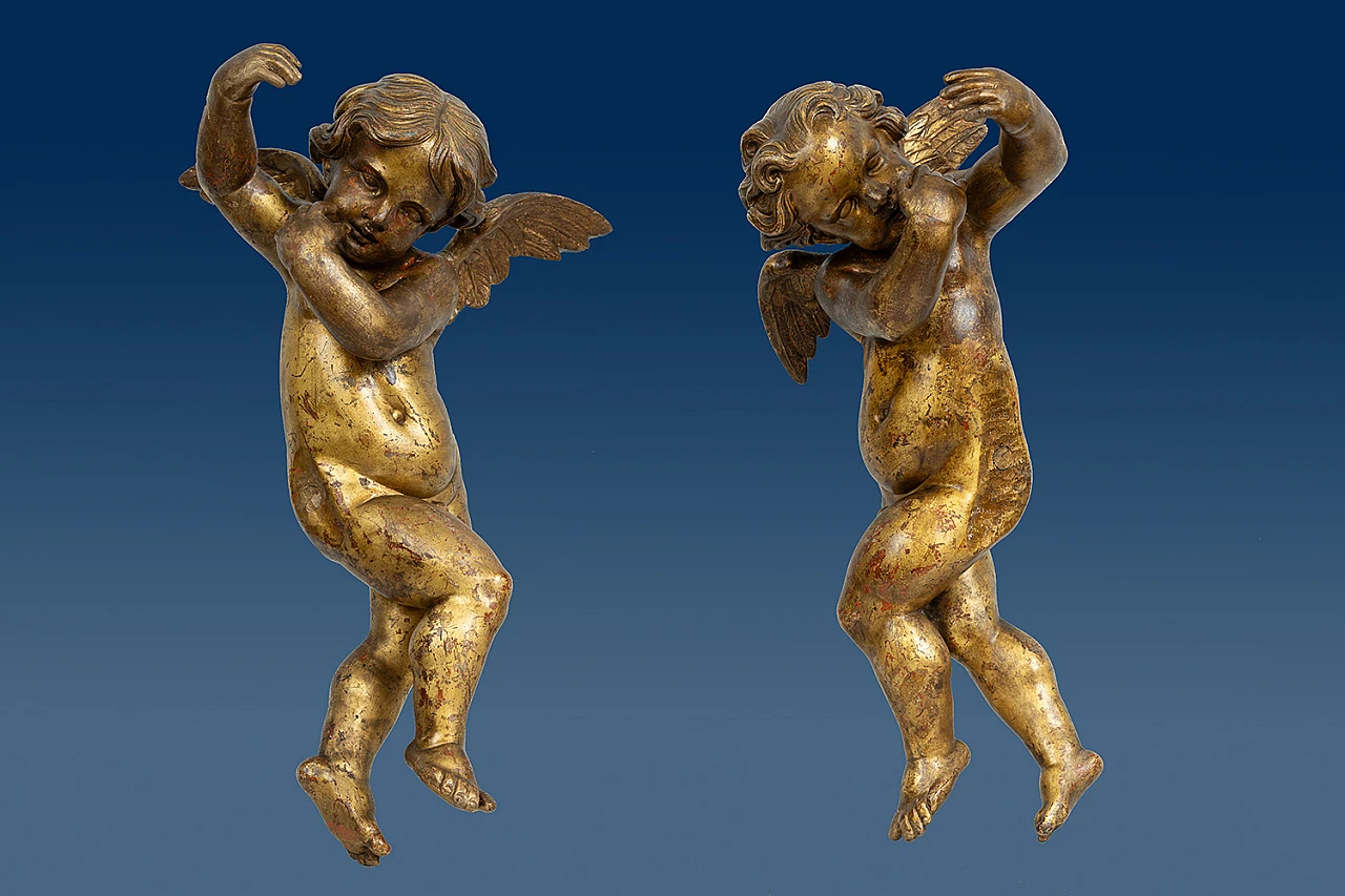 Pair of winged cherubs gilded and carved wood, Florence 16th century 1