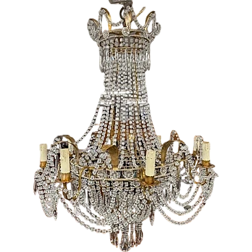 Antique chandelier from the early 1900s with 8 lights in golden metal