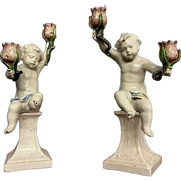 Pair of cherubs candle holders by Angelo Minghetti, late 19th century