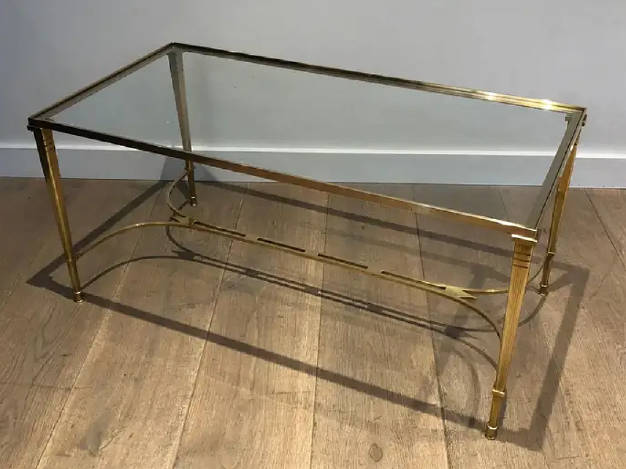 Brass coffee table with glass top by Maison Jansen, 1940s 4