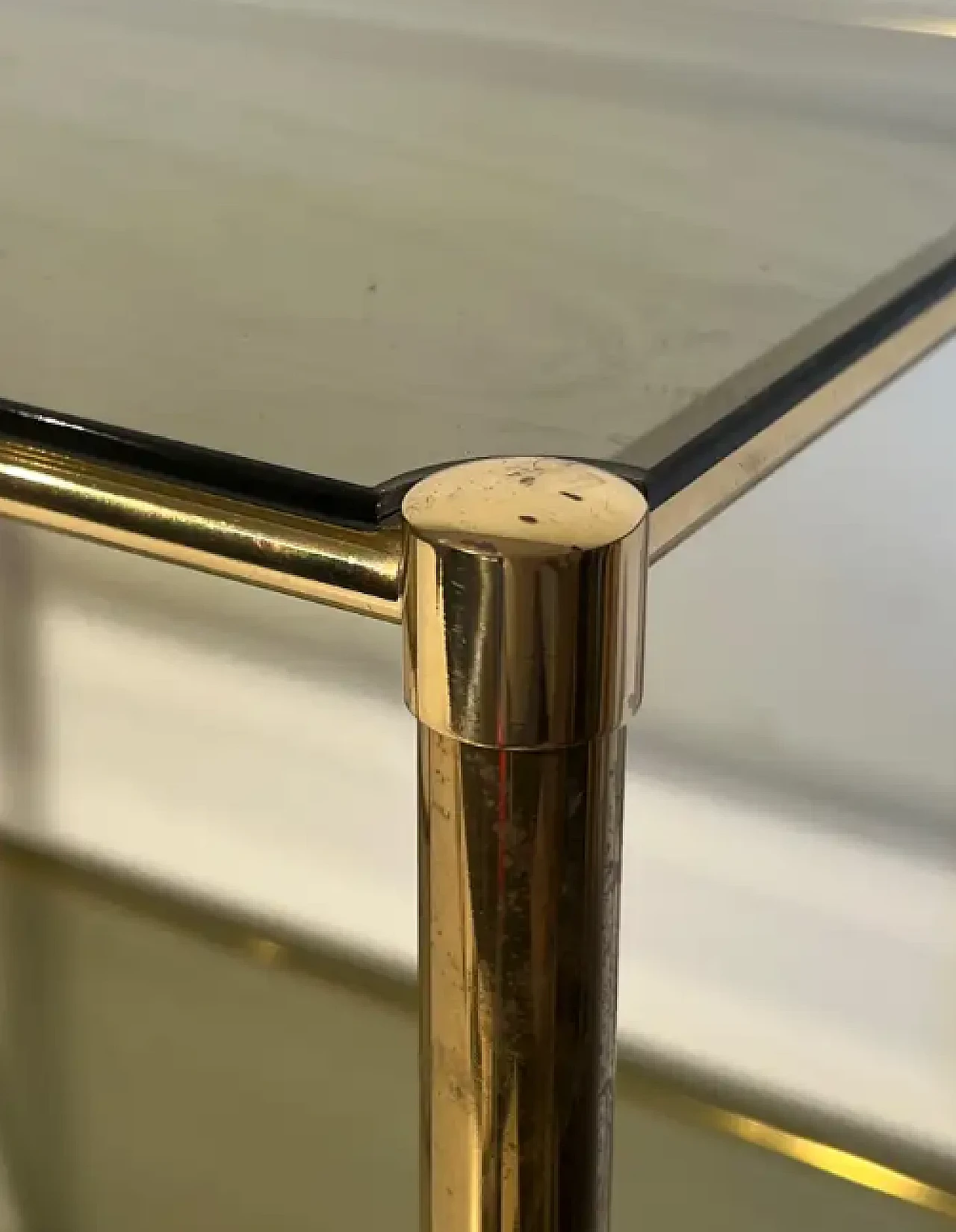 Pair of brass side tables with smoked glass shelves, 1970s 4