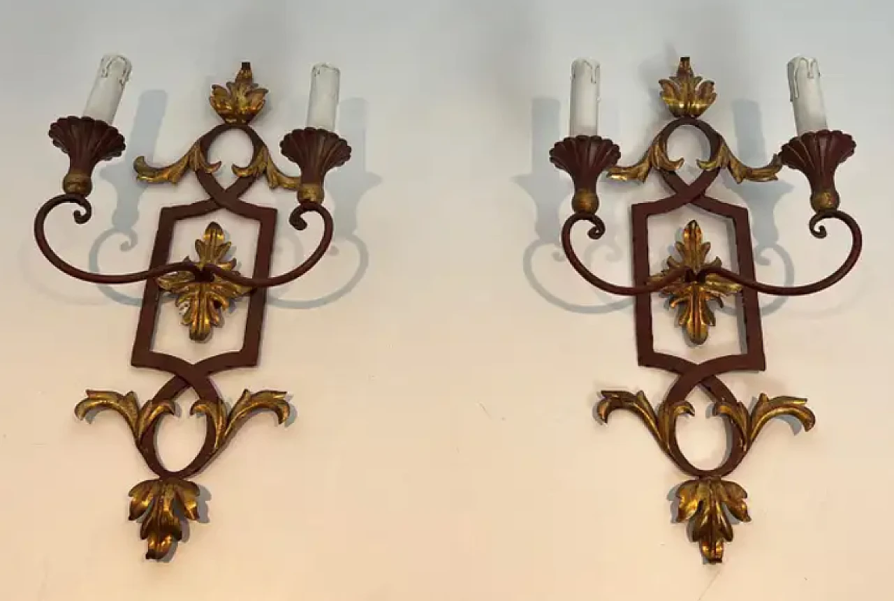 Pair of wrought iron and patinated wood wall sconces, 1940s 1