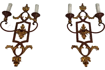 Pair of wrought iron and patinated wood wall sconces, 1940s