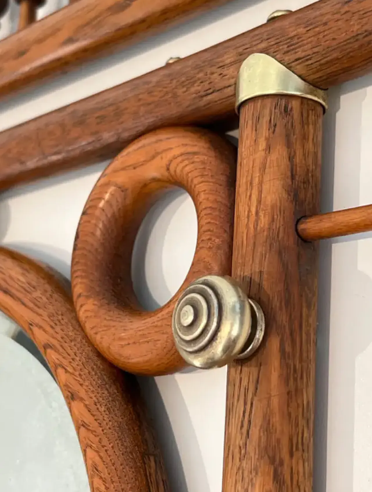 Wall-mounted coat rack in wood and curved brass, early 20th century 6