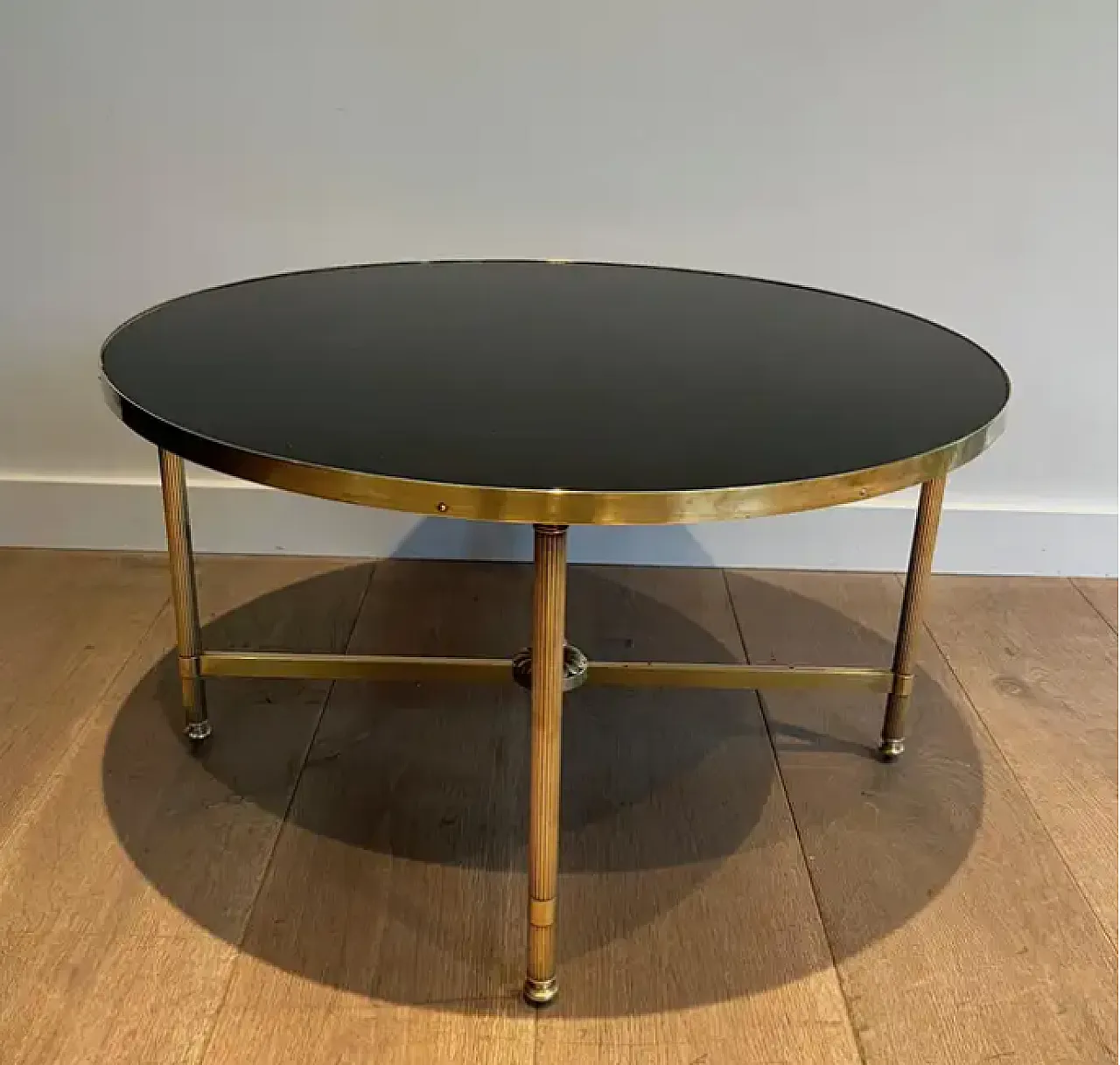 Brass coffee table with glass top by Maison Jansen, 1940s 9