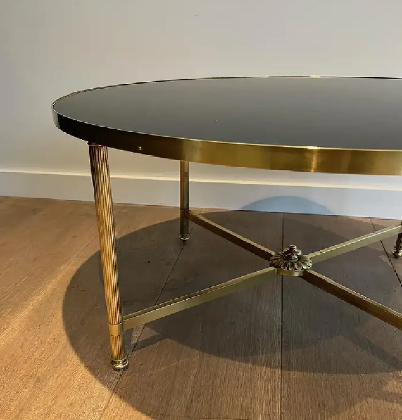 Brass coffee table with glass top by Maison Jansen, 1940s 10