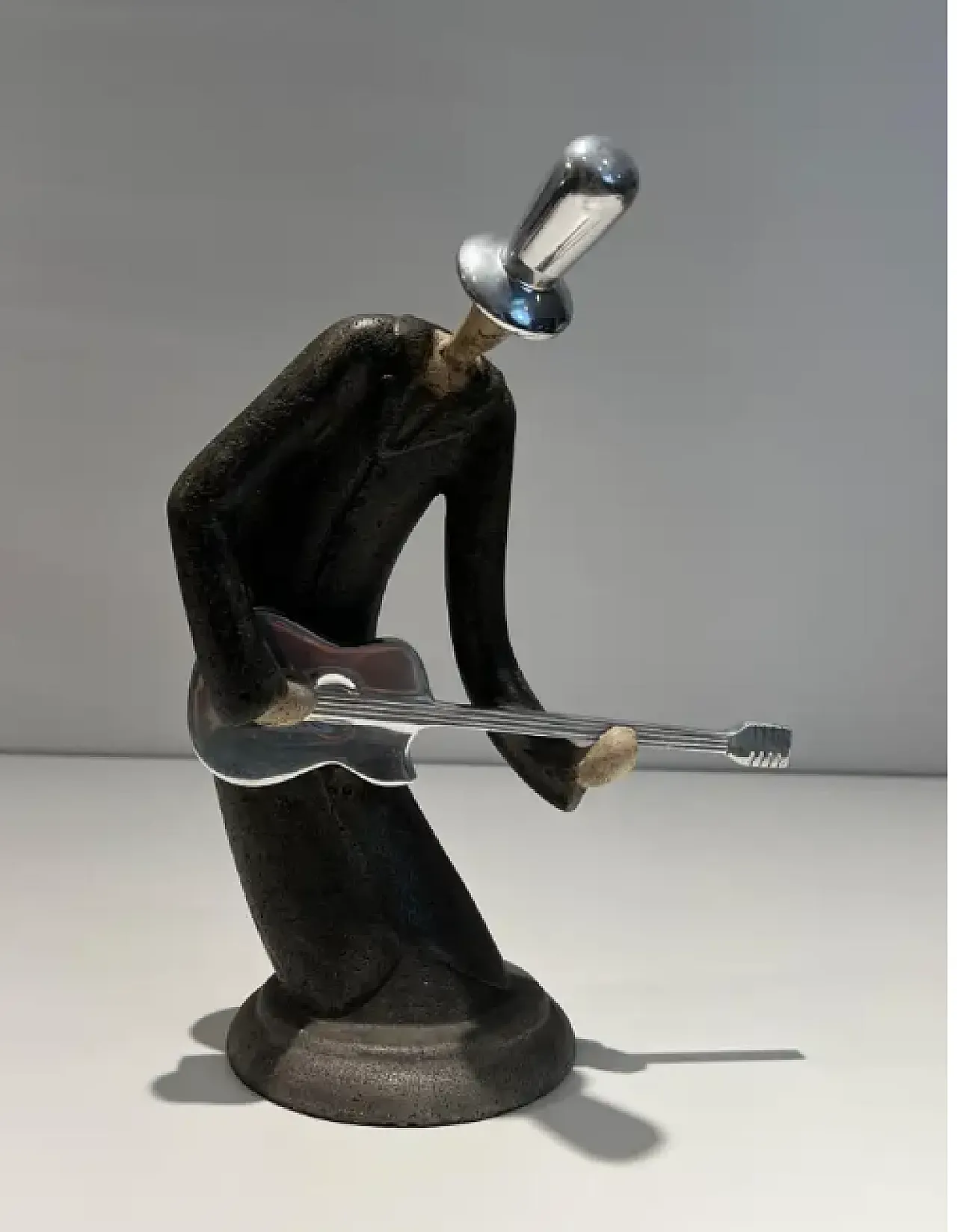 Sculpture of a guitarist in chrome and steel, 1970s 2