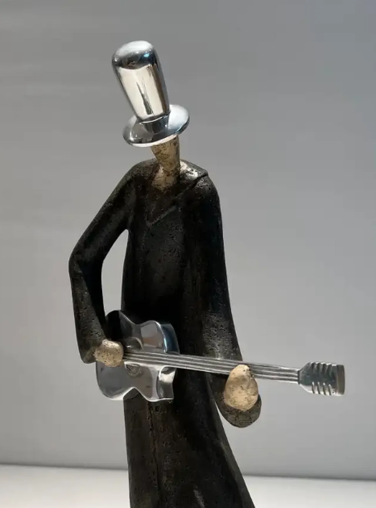 Sculpture of a guitarist in chrome and steel, 1970s 7