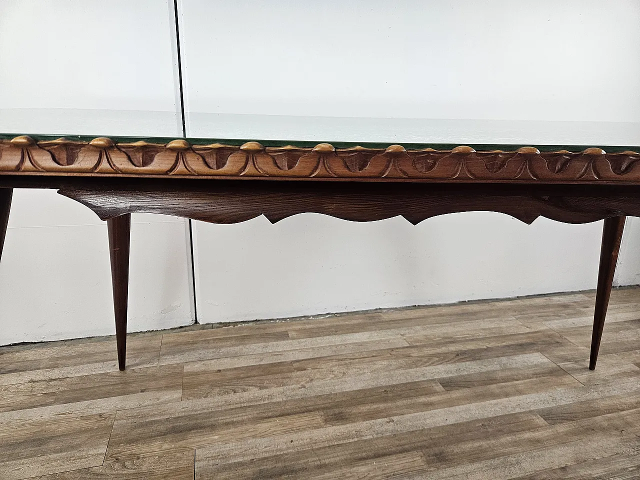 Table in carved wood with decorated green glass top, 60s 15